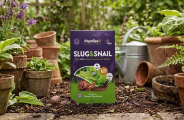 PlantGrow Natural Slug & Snail Barrier 3L pack displayed in a garden setting surrounded by potted plants and terracotta containers.