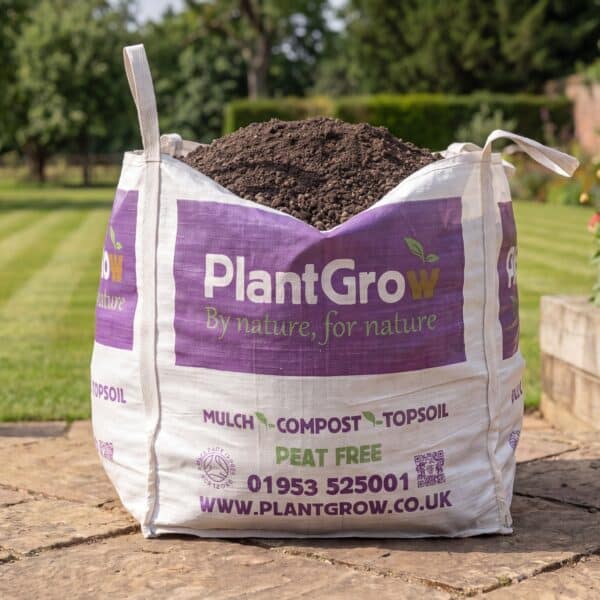 Close-up of PlantGrow Raised Bed Mix soil, showing screened topsoil, compost and organic fibre blend.